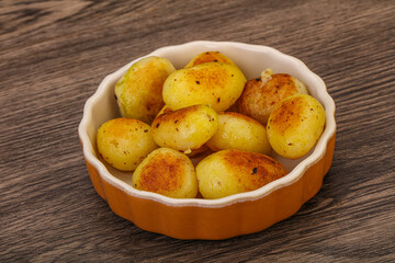 Naklejka na ściany i meble Roasted baby potato in the bowl