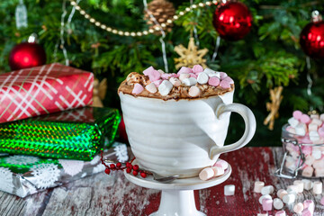 Obraz na płótnie Canvas Hot chocolate with whipped cream and marshmallows