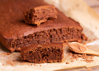 Sliced chocolate cake. Homemade baking. Homemade chocolate cake close-up. Brownie pie.