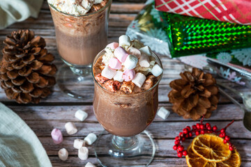 Obraz na płótnie Canvas Hot chocolate with whipped cream and marshmallows