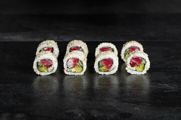 Sushi Rolls. Sushi Rolls Set, maki, philadelphia and california rolls, on a Black background.