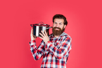 Perfect day for cooking. food preparation and cuisine. cooking utensils vessels. kitchen advertising. Man with saucepan. Man hold new brand pan. cooking pot in cook man hands in kitchen