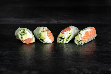 Sushi Rolls. Sushi Rolls Set, maki, philadelphia and california rolls, on a Black background.