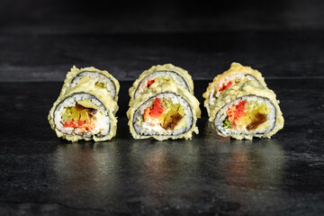Sushi Rolls. Sushi Rolls Set, maki, philadelphia and california rolls, on a Black background.