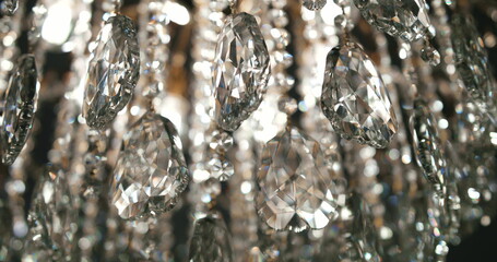 Blur crystal chandelier glitters in the light, Background bokeh