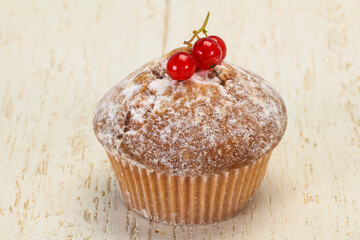 Sweet tasty muffin with red currants