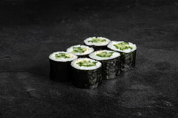 Sushi Rolls. Sushi Rolls Set, maki, philadelphia and california rolls, on a Black background.