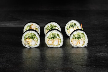 Sushi Rolls. Sushi Rolls Set, maki, philadelphia and california rolls, on a Black background.