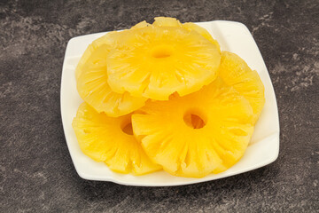 Marinated pineapple rings in the bowl