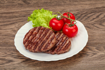 Grilled burger cutlet with sauce
