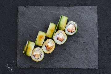 Rolls with eel, cucumber and tuna