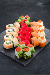 Big set of rolls with shrimp, salmon, eel, tuna and flying fish roe