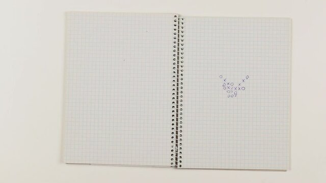 Playing gomoku five-in-a-row pan and paper version logic game