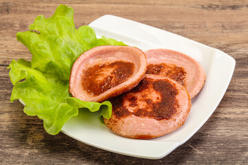 Roasted sausage slice in the plate