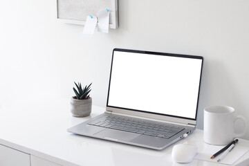 Workspace desk, laptop and credit cards. Business image, Blank screen laptop and supplies. laptop mock up screen view. work from home concept