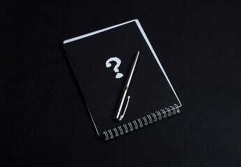 Question or interrogation mark over black background. Q and A concept
