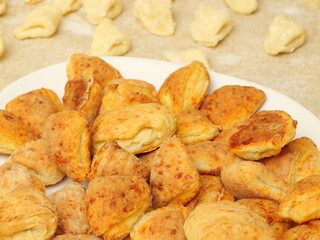 Fresh curd cookie. Baking dough pieces in the background. Selective focus.