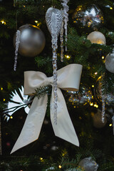 Christmas tree. New Year's toys. Cones, mittens, gloves, bows, balls, garlands. Concept of New...