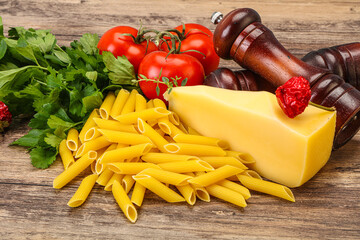 Raw penne rigate for cooking