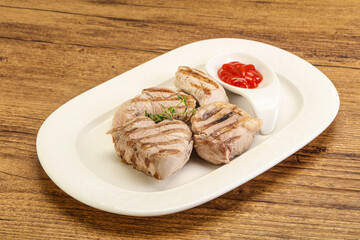 Grilled pork tenderlion with tomato sauce