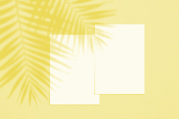 Blank white vertical paper sheet 5x7 inches with shadow overlay. Illuminating Pantone Color Of The Year 2021. Modern and stylish greeting card or wedding invitation mock up.