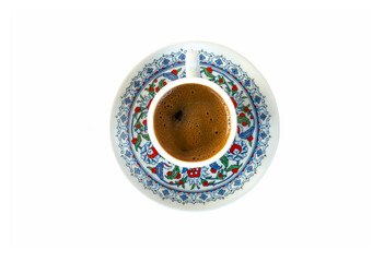 Sparkling Turkish coffee in a classic patterned Turkish Cup.