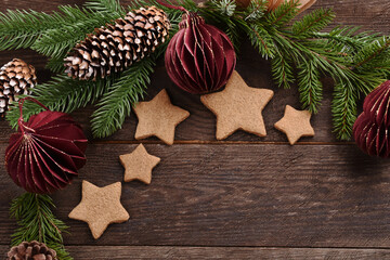Christmas flat lay with gingerbread cookies and paper decors