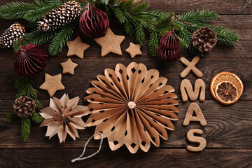 Christmas flat lay with gingerbread cookies and paper decors