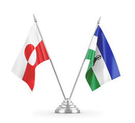 Lesotho and Greenland table flags isolated on white 3D rendering © Aleks Taurus
