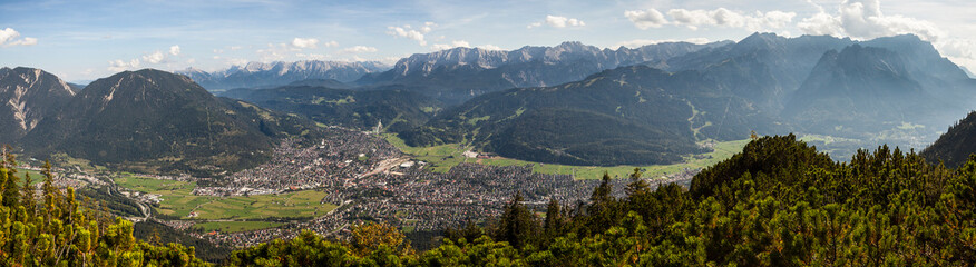 Fototapeta na wymiar View to Garmisch-Partenkirchen from Kramerspitze mountain, in Bavaria, Germany