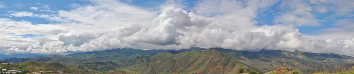 Fototapeta premium Mountain range vari Dzor got clouds