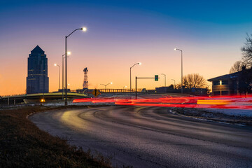 Des Moines 801 Grand Ave. with light trails at sunset.