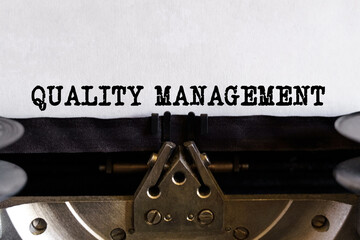 Vintage typewriter with typed text - QUALITY MANAGEMENT