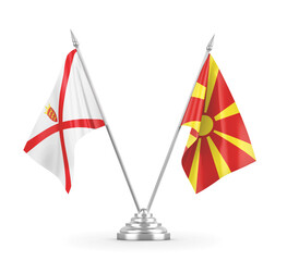 North Macedonia and Jersey table flags isolated on white 3D rendering