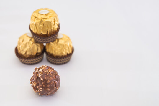 Kiev, Ukraine-December 20, 2020: Ferrero Rocher is a chocolate brand made by Italian manufacturer Ferrero SpA.