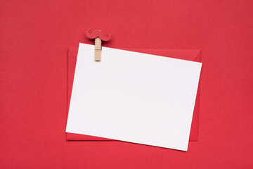 Happy fathers day concept. Close up flat lay photo image of clear with copy space card envelope and pin with mustache isolated bright background