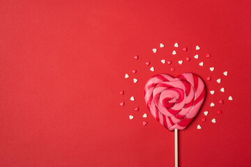 Happy Valentines day concept. Overhead above close up view photo picture of yummy lollypop with sugar topping isolated vivid color red background with blank empty space