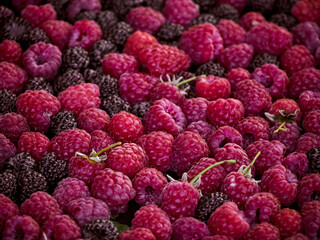 Fresh sweet berries raspberries background