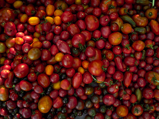 Background with ripe red tomatoes..