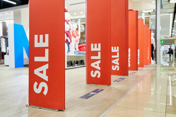 Discount information at store entrance, shopping season promotion concept