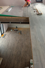 installation of a laminate in the private house, a laminate of dark color.
