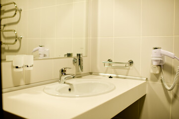 furniture and plumbing in the bathroom