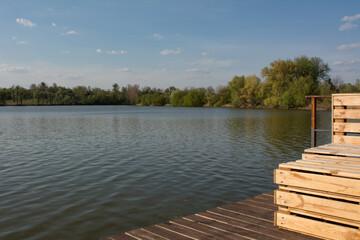 wooden pier on the lake - 400620313