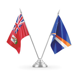 Marshall Islands and Bermuda table flags isolated on white 3D rendering