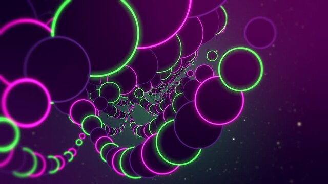 Curled neon green and violet chain of circles moving towards camera with starry space background.