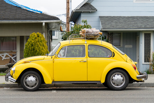 Everett, WA - USA - 04-21-2020: Circa 1973 Vintage Yellow Volkswagon Beetle