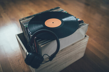 Vinyl record on stack of records collection