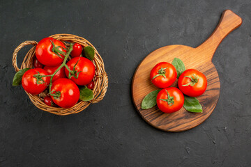 top view fresh red tomatoes inside basket on dark background color salad food photo