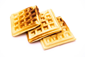 Appetizing Belgian homemade waffles on a white background