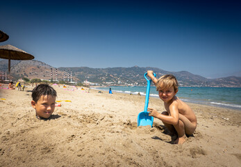 Boys playing at beach
